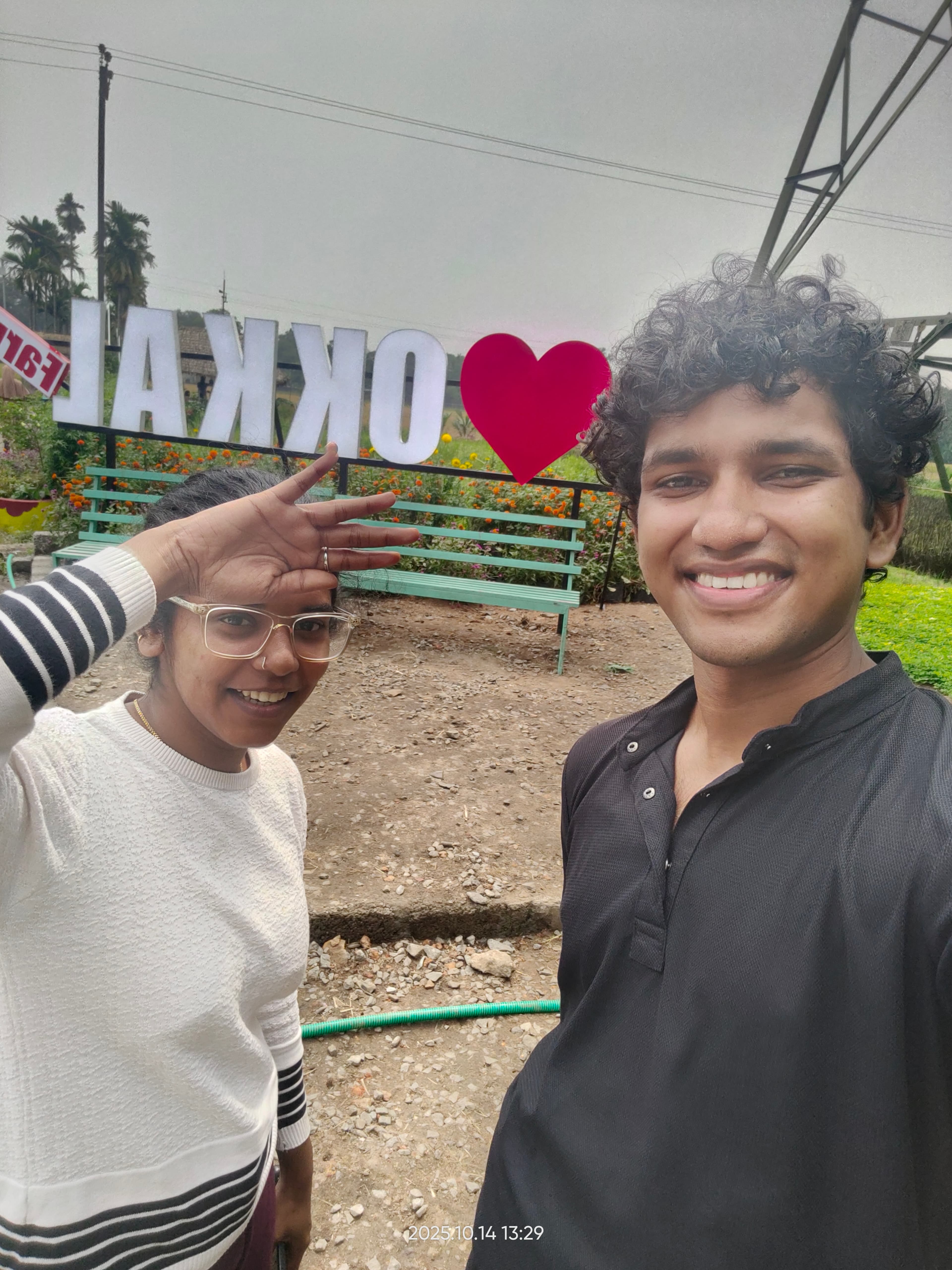 Selfie with a heart sign